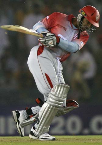 Kumar Sangakkara had to retire hurt during his innings. He strained his side, but came out to bat again with a runner. — <i>PTI Photo</i> 22nd Match: Kings XI vs Knight Riders