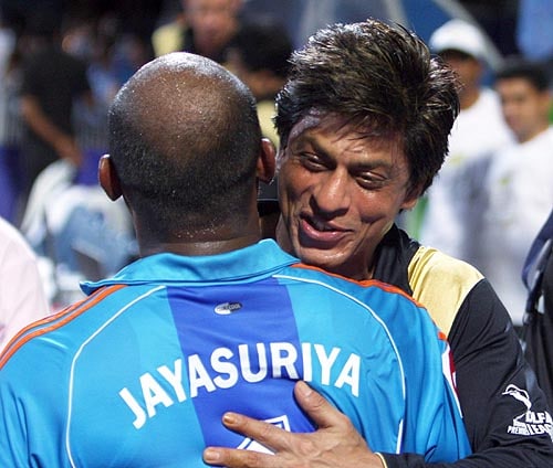 Displaying his sportsmanship, Shah Rukh Khan hugged and congratulated Mumbai Indians' Sanath Jayasuriya for his team's win against Kolkata Knight Riders. (PTI Photo) 38th Match: Mumbai Indians vs Kolkata Knight Riders