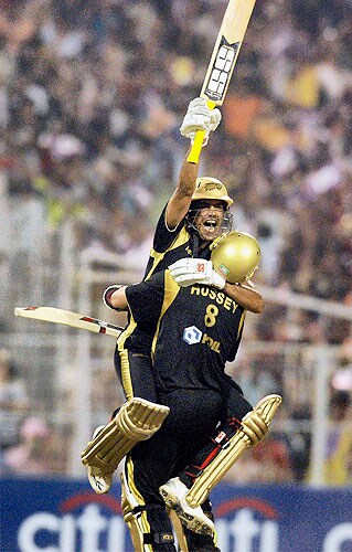 Kolkata Knight Riders' Laxmi Ratan Shukla celebrates with team-mate David Hussey after the winning stroke against Hyderabad Deccan Chargers during the IPL T20 match at Eden Garden in Kolkata on Sunday. (PTI Photo) 4th Match: Kolkata Knight Riders vs Deccan Chargers