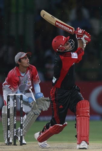 Virender Sehwag was in imperious form before rain halted the Delhi innings. — <i>PTI Photo</i> 40th Match: Delhi Daredevils vs Kings XI Punjab