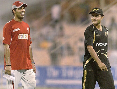 Kings XI Punjab team captain Yuvraj Singh shares a light moment with skipper of the Kolkata Knight Riders Saurav Ganguly during the IPL match at Eden Gardens in Kolkata on Sunday. (PTI Photo) 52nd Match: Kolkata Knight Riders vs Kings XI Punjab