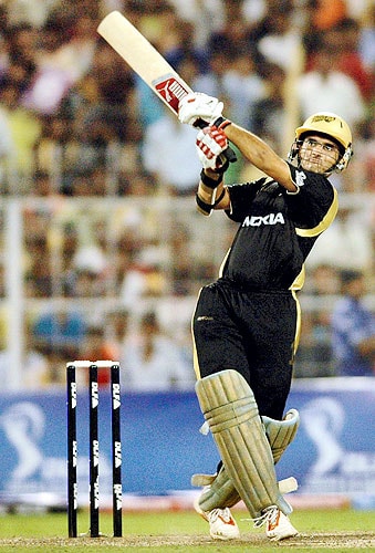 Skipper of Kolkata Knight Riders Sourav Ganguly hits a boundary in the last over against Kings XI Punjab bowler Irfan Pathan during the IPL match at Eden Garden in Kolkata night. (PTI Photo) 52nd Match: Kolkata Knight Riders vs Kings XI Punjab