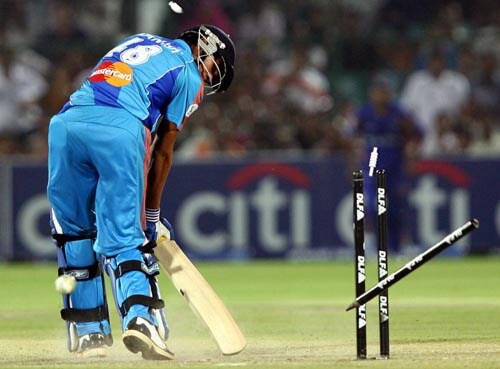 Mumbai's batsmen struggled to accelerate. After a steady start from Tendulkar and Jayasuriya, they made just 145. Here, Manish Pandey is bowled by Sohail Tanvir. —<i>PTI Photo</i> 53rd Match: Rajasthan Royals vs Mumbai Indians