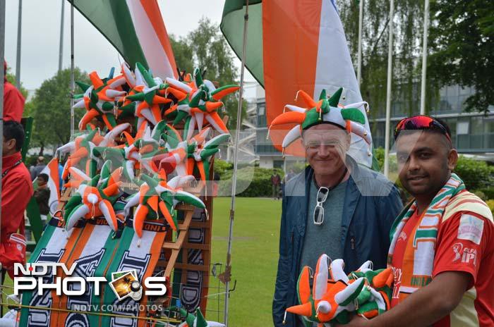A souvenir seller showcasing the supporter hats for Indian fans outside the Swalec Stadium. Excitement high among fans and alike ahead of Champions Trophy opener