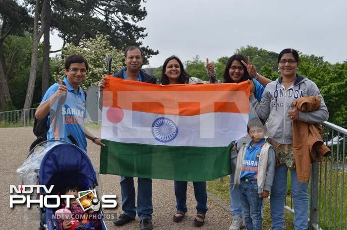 An Indian family posing with the tricolour as they look eager for the start of India vs South Africa Champions Trophy opening tie in Cardiff. Excitement high among fans and alike ahead of Champions Trophy opener