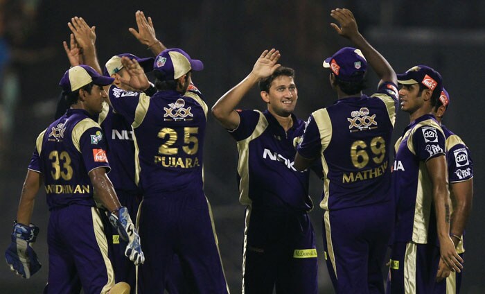 Ajit Agarkar (facing camera) celebrates with teammates after he picks up the wicket of Deccan Chargers skipper Adam Gilchrist during their IPL T20 match at Eden Gardens. (PTI Photo) IPL 3: Kolkata vs Chargers