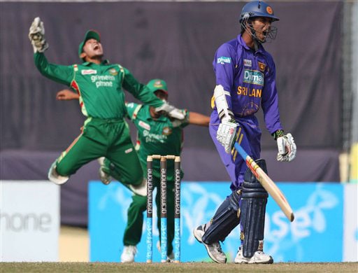 Mushfiqur Rahim reacts at the dismissal of Upul Tharanga on the final match of a triangular limited-overs international series between Bangladesh and Sri Lanka in Dhaka. Sri Lanka win tri-series final