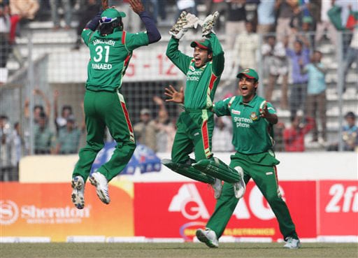 Mushfiqur Rahim celebrates the dismissal of Chamara Kapugedara with teammates Junaid Siddique and Tamim Iqbal on the final match of a triangular limited-overs international series between Bangladesh and Sri Lanka. Sri Lanka win tri-series final
