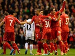 Photo : EPL: Liverpool bully Swansea, Spurs stunned at Norwich