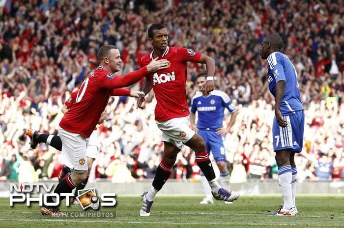 Nani, third right, is congratulated by teammate Wayne Rooney after scoring a goal against Chelsea during their English Premier League soccer match at Old Trafford. (AP Photo) Manchester United thrash Chelsea 3-1