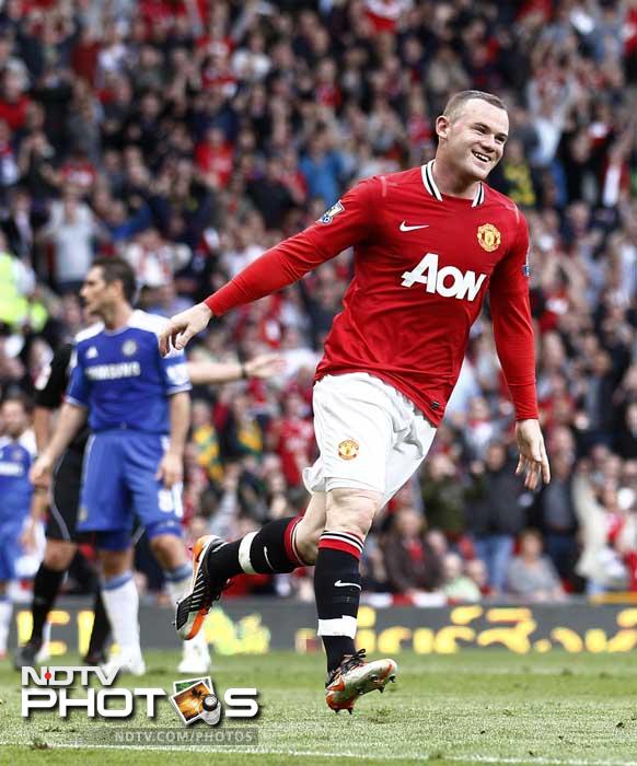 Wayne Rooney, right, celebrates after scoring a goal against Chelsea during their English Premier League soccer match at Old Trafford. (AP Photo) Manchester United thrash Chelsea 3-1