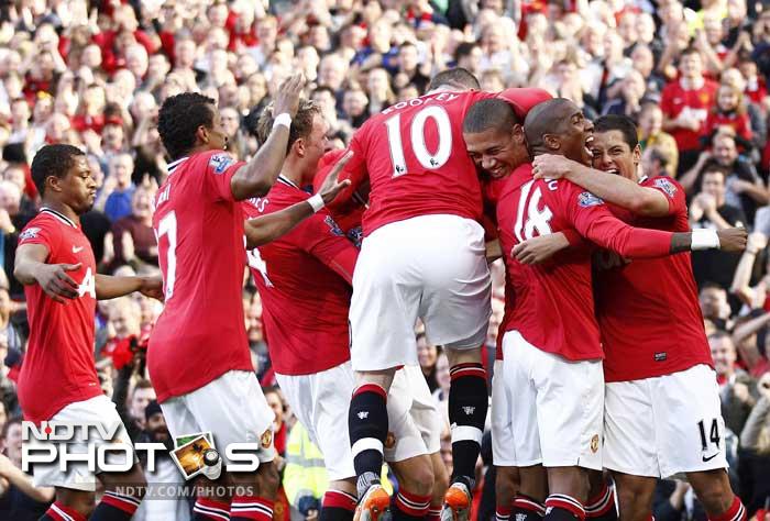 Chris Smalling, Nani and Wayne Rooney score to give the Red Devils a commendable win over rivals Chelsea at Old Trafford, Manchester.(AP Photo) Manchester United thrash Chelsea 3-1