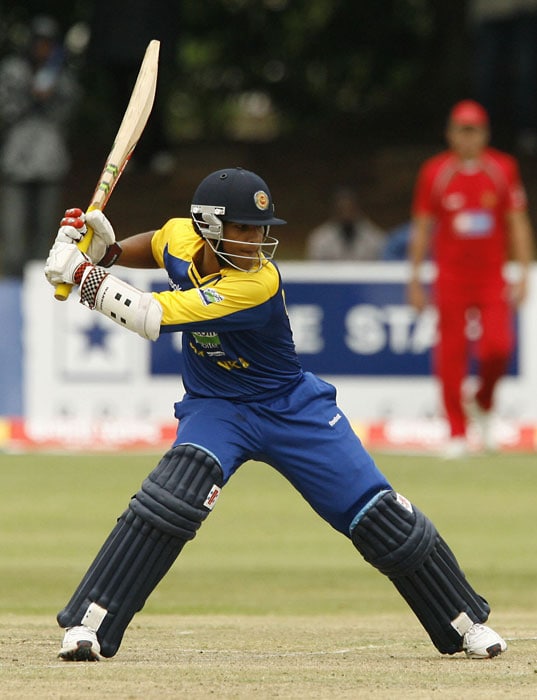 Sri Lankan batsman Dinesh Chandimal plays a shot during the first innings. Sri Lanka won the toss and chose to field first. (AFP PHOTO) 3rd ODI: Zim vs SL