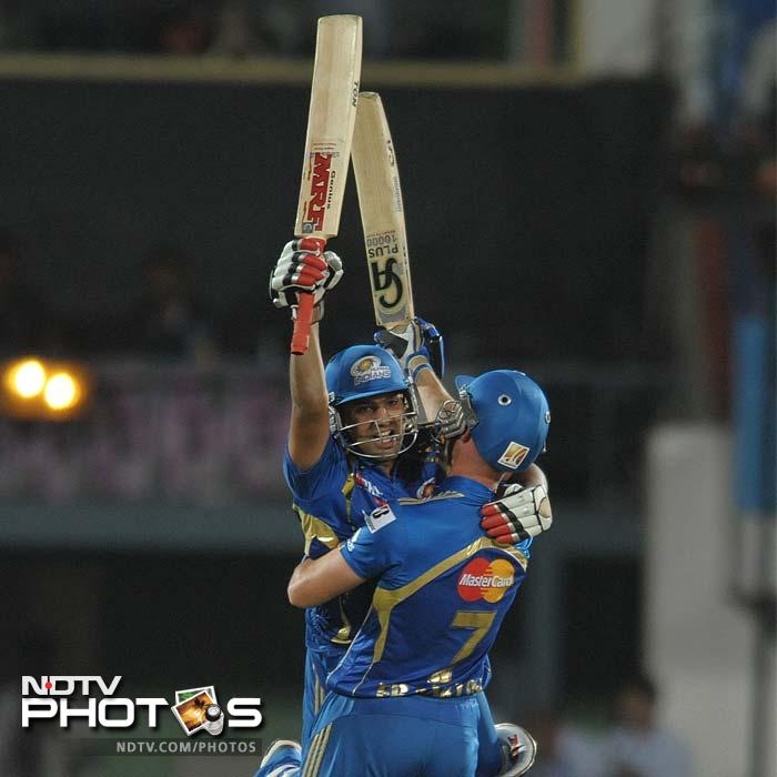 There were many heroes when Mumbai Indians took on Deccan Chargers in the ninth match of the Indian Premier League. It was Rohit Sharma's power though that took the match away from the hosts in Vizag, off the last ball. (AFP PHOTO / Noah SEELAM) IPL 5: Mumbai defeat Deccan in a thriller