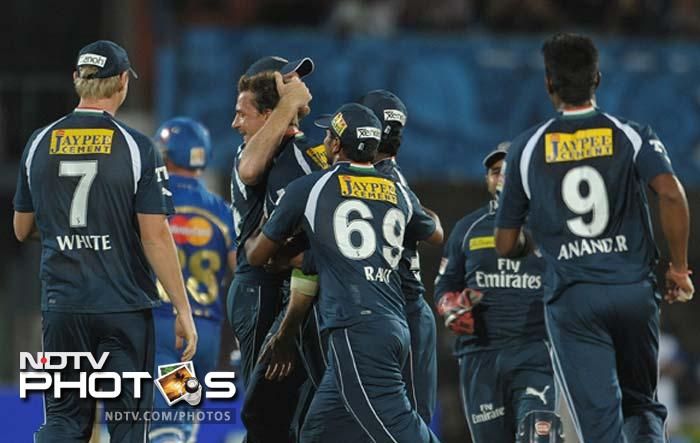 Steyn dislodged both openers - T Suman and Richard Levi - with the score on 10 in 4 overs. Mumbai were left reeling as the scoring in the next few overs was painfully slow. (AFP PHOTO / Noah SEELAM) IPL 5: Mumbai defeat Deccan in a thriller