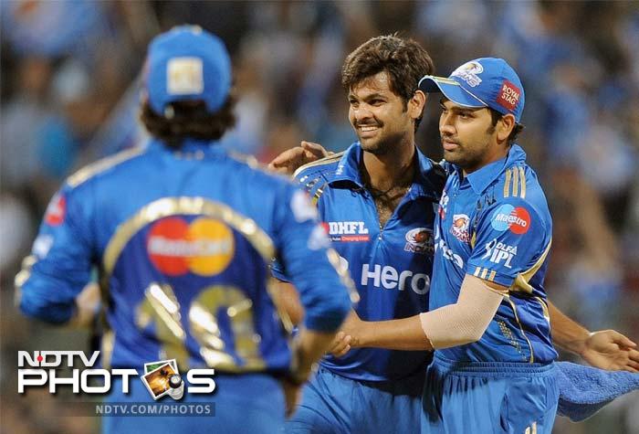 RP Singh started the slide for Deccan when he claimed opener Parthiv Patel who had given his side a good start with partner Shikhar Dhawan. (AFP PHOTO/Punit PARANJPE) IPL 5: Mumbai edge past Deccan in low-scorer