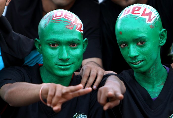 Fans of Kings XI Punjab cheer for their team before the start of the Indian Premier League match against Rajasthan Royals in Mohali on Wednesday. (PTI Photo) IPL 3: Mohali vs Rajasthan