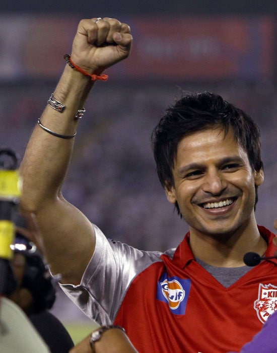 Bollywood actor Vivek Oberoi waves to his fans before the start of the Indian Premier League 3 match between Kings XI Punjab and Rajasthan Royals in Mohali. (PTI Photo) IPL 3: Mohali vs Rajasthan