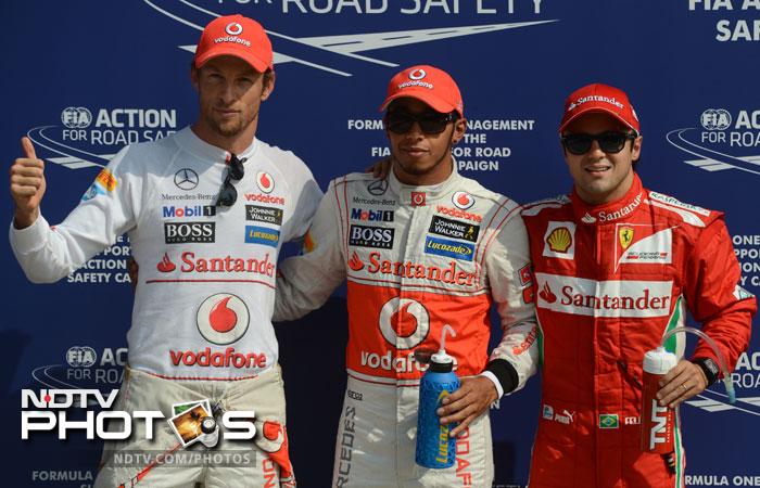 Lewis Hamilton grabbed his 4th pole of the season and 23rd overall of his career as McLaren took 1-2 for the Sunday's race. Hamilton and Button will be followed by Felipe Massa and Michael Schumacher on the grid. Paul di Resta of Force India qualified 4th but will start 9th after a 5-place penalty for gearbox change. (All AFP Photos) Italian Grand Prix: Qualifying session, Hamilton grabs pole