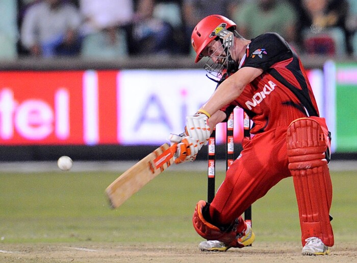 South Australian Redbacks batsman Daniel Harris plays a shot from Mumbai Indians bowler Kieron Pollard during the Champions League Twenty20 League match between the Mumbai Indians and the South Australian Redbacks at the Kingsmead Stadium in Durban. (AFP Photo) CLT20: Mumbai vs Redbacks