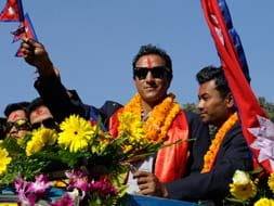 Nepal cricket team welcomed home in style