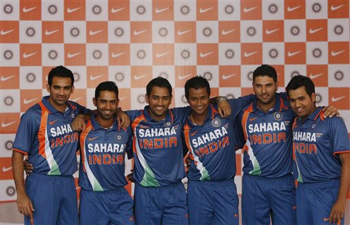 Zaheer Khan, Dinesh Karthik, Mahendra Singh Dhoni, Pragyan Ojha, Yuvraj Singh and Rohit Sharma pose wearing the new apparel for the Indian one-day international team in Mumbai on Wednesday. (AP Photo) New jersey for Team India