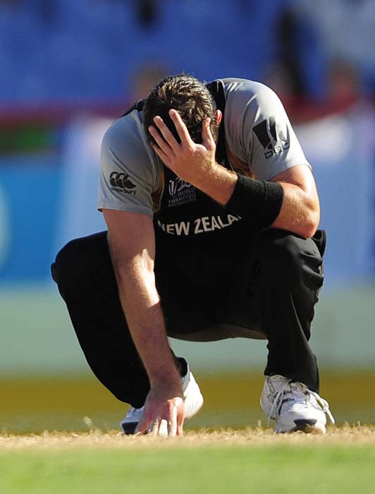 A disappointed Ian Butler reacts during the Super Eight match against England.(AFP PHOTO) WT20: NZ vs Eng