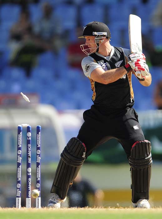 Gareth Hopkins looks at the stumps as he is bowled out during New Zealand's Super Eight encounter against England.(AFP PHOTO) WT20: NZ vs Eng