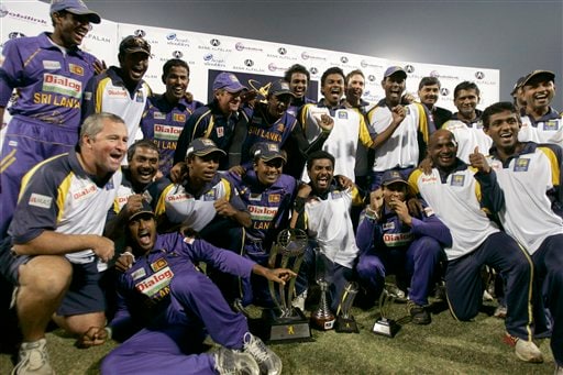 Sri Lankan players pose with winning trophy after won series and third one-day international cricket match against Pakistan at Gaddafi Stadium in Lahore on Saturday, January 24, 2009. Sri Lanka inflicted Pakistan's heaviest defeat in a limited-overs international, winning the final game by 234 runs to clinch the three-match series 2-1. (AP Photo) 3rd ODI: Pakistan vs Sri Lanka