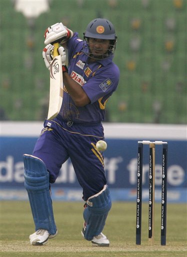 Sri Lankan batsman Kumar Sangakkara plays a shot against Pakistan during their third one-day international cricket match at Gaddafi Stadium in Lahore on Saturday, January 24, 2009. (AP Photo) 3rd ODI: Pakistan vs Sri Lanka