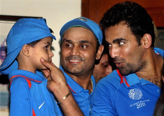 Sehwag With Wife And Son Photo Gallery