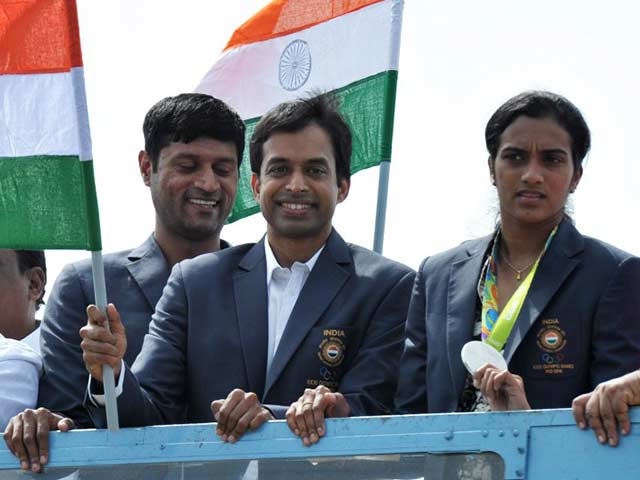 PV Sindhu, Coach Gopichand Receive Grand Welcome In Hyderabad