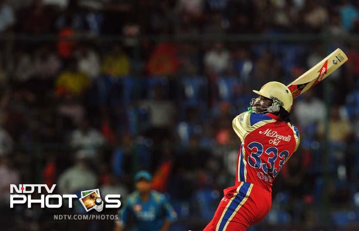 The Jamaican fired five consecutive sixes off a single Rahul Sharma over to set pulses racing. (AFP PHOTO/Manjunath KIRAN) IPL 5: Bangalore down Pune in a thriller
