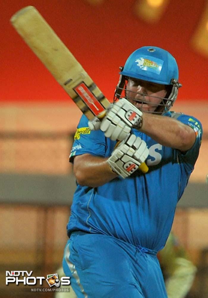 The match itself began with Pune opting to bat first and setting the pace in Bangalore. Ryder slammed 31 runs in quick time before falling to Harshal Patel. (AFP PHOTO/Manjunath KIRAN) IPL 5: Bangalore down Pune in a thriller
