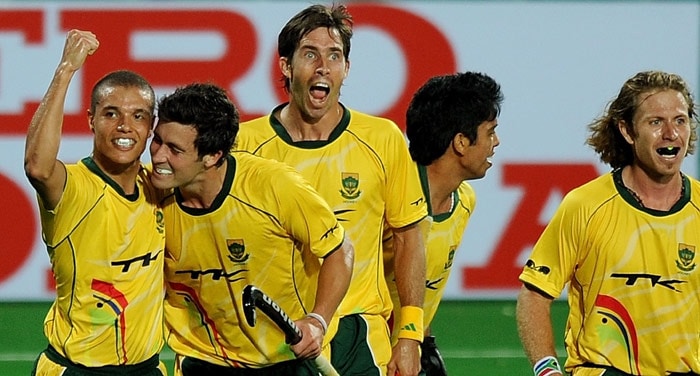 South African hockey player Marvin Harper (L) celebrates with teammates after scoring his team's fourth goal against Pakistan during their World Cup 2010 match at the Major Dhyan Chand Stadium in New Delhi. (AFP Photo) South Africa defeat Pakistan