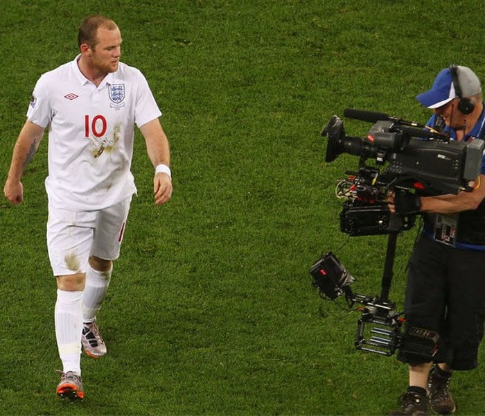 Rooney has not been able to transform his club form onto the international level as he has failed to deliver in the two World Cups that he has played so far.<br><br>
The stage was set for him to take England to glory in the World Cup South Africa but he went goalless in the tournament.<br><br>
During the 2010 World Cup in South Africa, after England drew with Algeria, the England players were booed off the pitch by supporters. Rooney made a comment as he left the pitch to television cameras saying, "Nice to see your home fans boo you, that's loyal supporters".<br><br>
Post World Cup too Rooney has been struggling and recent reports suggest that his Manchester United days might be counted as both the player and and the club want an end to their association, thus putting a question mark on the mercurial strikers' future.<br><br>
<a href="http://www.ndtv.com/convergence/ndtv/new/forums/readforum.aspx?trdid=3699" class="fn fl">What tip should Sachin give Rooney?</a></span> 'Rooney must learn from Sachin'