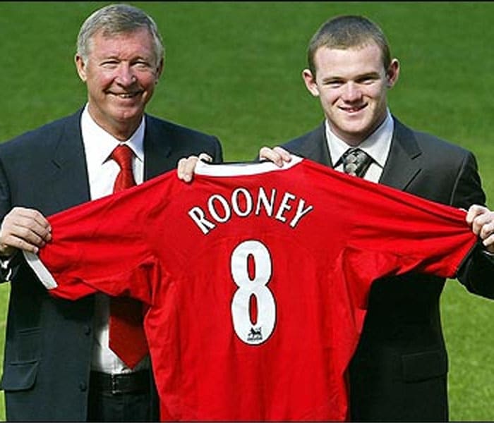 At the end of the 2003–04 season, citing Everton's inability to challenge for European competition, Rooney requested for a transfer out of the club.<br><br>
After a bitter bidding war, Manchester United signed the young prodigy for £25.6 million. It was the highest fee paid for a player aged under 20; Rooney was still only 18 years old when he left Everton.<br><br>
He subsequently went on to earn the English cap and his international tournament was the EURO 2004 where he became the competitions youngest scorer.<br><br>
<a href="http://www.ndtv.com/convergence/ndtv/new/forums/readforum.aspx?trdid=3699" class="fn fl">What tip should Sachin give Rooney?</a></span> 'Rooney must learn from Sachin'