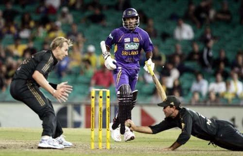 Sri Lanka's Chaminda Vaas, center, is run out by Australia's Ricky Ponting, right, as Brett Lee looks on at the Sydney Cricket Ground, in Australia, on Friday, February 8, 2008, during their one-day international cricket match. Australia made 253 in their innings. 3rd Match: Aus-Lanka