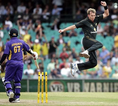 Brett Lee, right, jumps up after bowling out Sri Lanka's Sanath Jayasuriya, left, for 7 runs at the Sydney Cricket Ground on Friday, February 8, 2008 during their one-day international cricket match. Australia made 253 in their innings. 3rd Match: Aus-Lanka