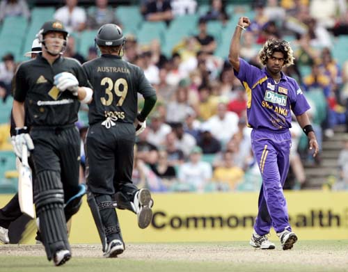 Lasith Malinga, right, celebrates after taking the wicket of Australia's James Hopes, second left, at the Sydney Cricket Ground on Friday, February 8, 2008 during their one-day international cricket match. 3rd Match: Aus-Lanka