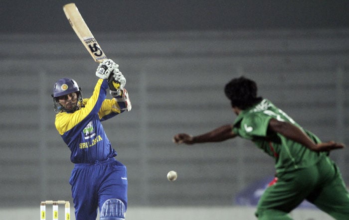 Sri Lanka's Tilakaratne Dilshan plays a shot during their first One-Day International of the tri-series in Dhaka. (AP Photo) 1st ODI: SL vs B'desh