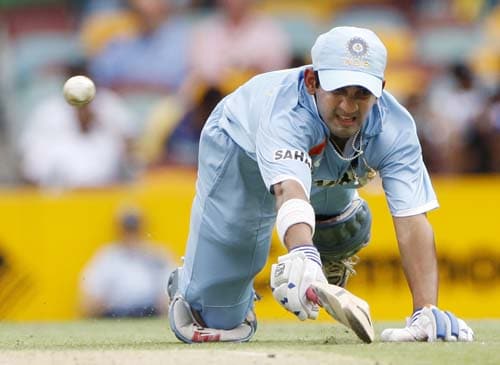 Gautam Gambhir dives to make his ground during their One-Day cricket international against Sri Lanka in Brisbane on Tuesday, February 5, 2008. 2nd Match: India-Lanka