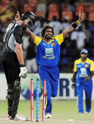Sri Lanka's Lasith Malinga celebrates after dismissing New Zealand batsman Ian Butler during the first ODI of the Tri-Nation Championship trophy at The R Premadasa Stadium in Colombo. (AFP Photo) Tri-series: SL vs NZ