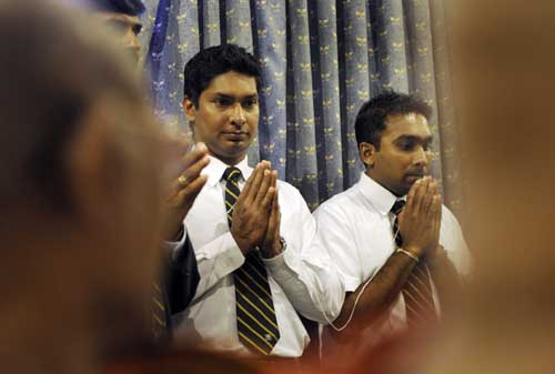 Kumar Sangakkara and teammate Mahela Jayawardene are blessed by a Buddhist monk in Colombo before leaving for England to play in the ICC Twenty20 World Cup. (AFP Photo) Sri Lankans leave for T20 WC