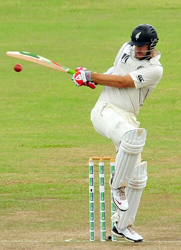 New Zealand captain Daniel Vettori plays a stroke during the third day of the first Test match at The Galle International Cricket Stadium in Galle on Thursday. (AFP Photo) SL vs NZ: 1st Test, Day 3