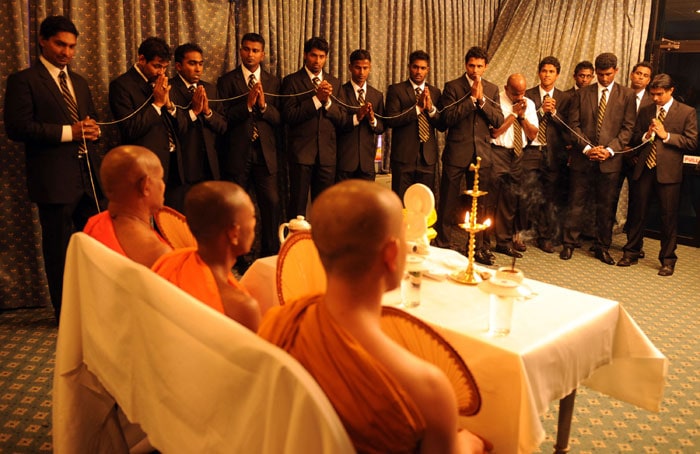 Sri Lankan cricket team members observe Buddhist rituals at the Sri Lanka Cricket headquarters in Colombo on April 24, 2010.<br><br>The team performed religious rituals ahead of their departure to ICC Twenty20 World Cup in West Indies. (AFP Photo) Sri Lankan team leaves for the Caribbean