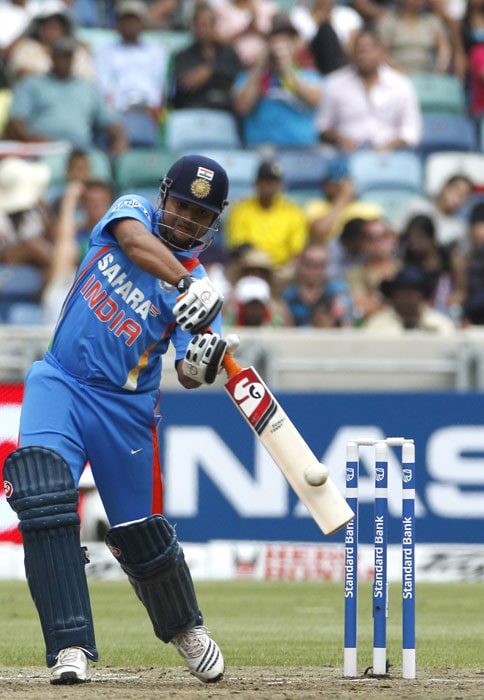 Suresh Raina plays a shot off Makhaya Ntini during the Twenty20 cricket match at the Moses Mabhida stadium in Durban. (AP Photo) T20: India vs South Africa