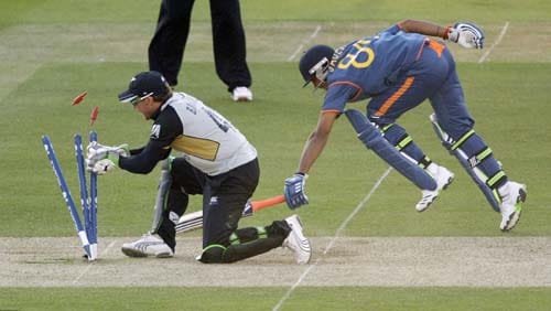 Ravindra Jadeja runs in safely to avoid being run out by New Zealand wicketkeeper Brendon McCullum during the Twenty20 World Cup warm-up match between India and New Zealand at Lord's cricket ground in London on Monday. (AP Photo) India vs NZ warm-up match