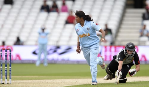 Aimee Watkins makes it back to the crease as Rumeli Dhar attempts a run out during their ICC World Twenty20 Women's semi-final match match at Trent Bridge. (AP Photo) WT20: NZ vs IND