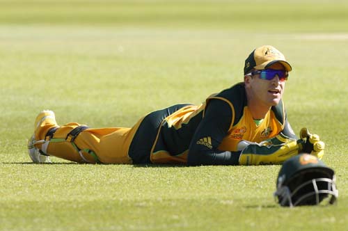Australia's Brad Haddin falls during their warm-up Twenty20 World Cup match against Bangladesh at Trent Bridge cricket ground in Nottingham, England on Monday. (AP Photo) Aus vs B'desh warm-up tie